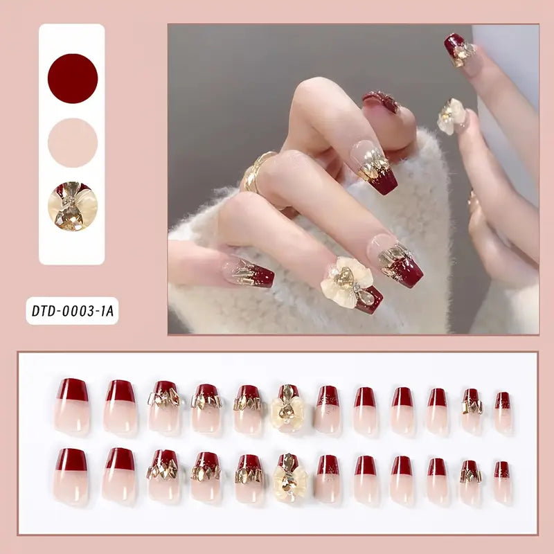 Elegant Red and Nude Gradient Press-On Nails with Gold Embellishments