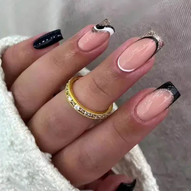 Chic Black and Nude French Nails with Glitter Accents